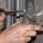 repair garage door rollers