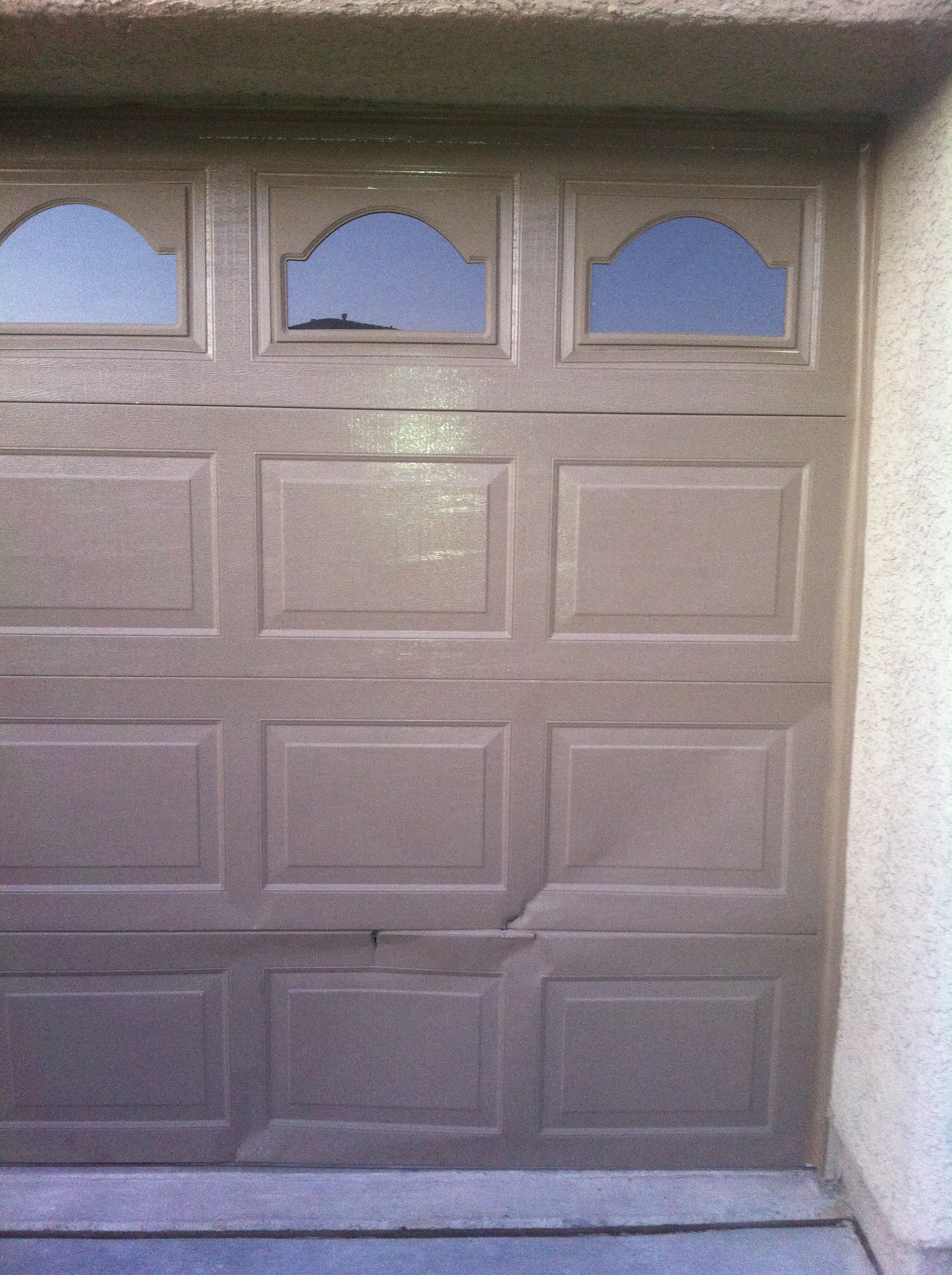 broken garage door panels