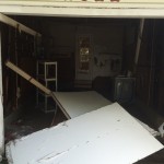 old one piece garage door over to a sectional roll up garage door