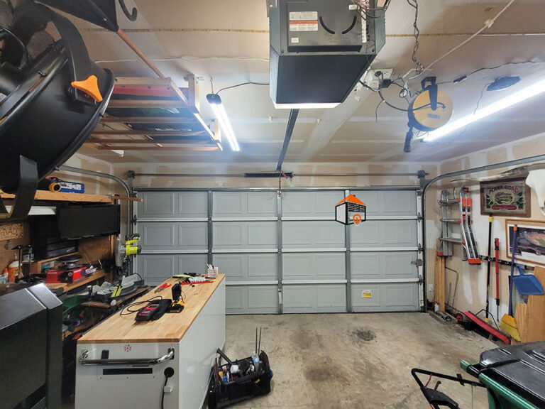 How-much-weight-can-a-1⁄2-HP-garage-door-opener-can-lift