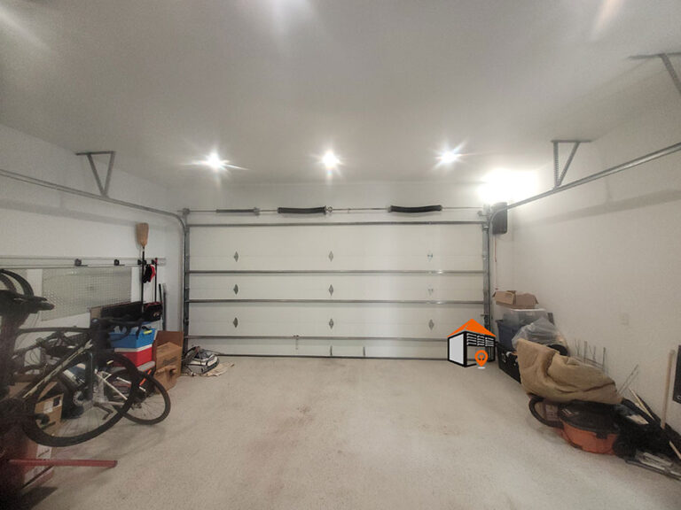 I-have-a-two-car-garage-and-my-one-piece-garage-door-sags-in-the-middle-when-the-door-is-in-the-up-position-is-that-normal-or-should-I-fix-that_